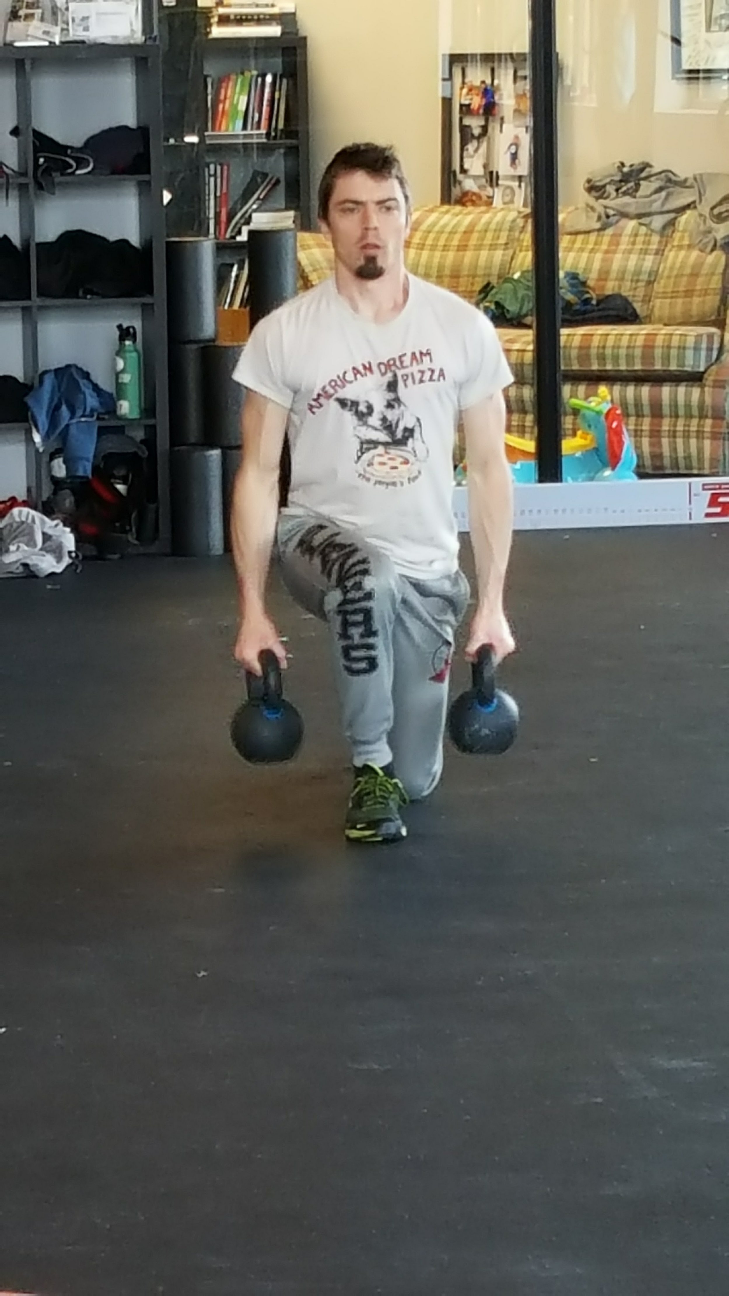 Athletes train with kettlebells to build strength