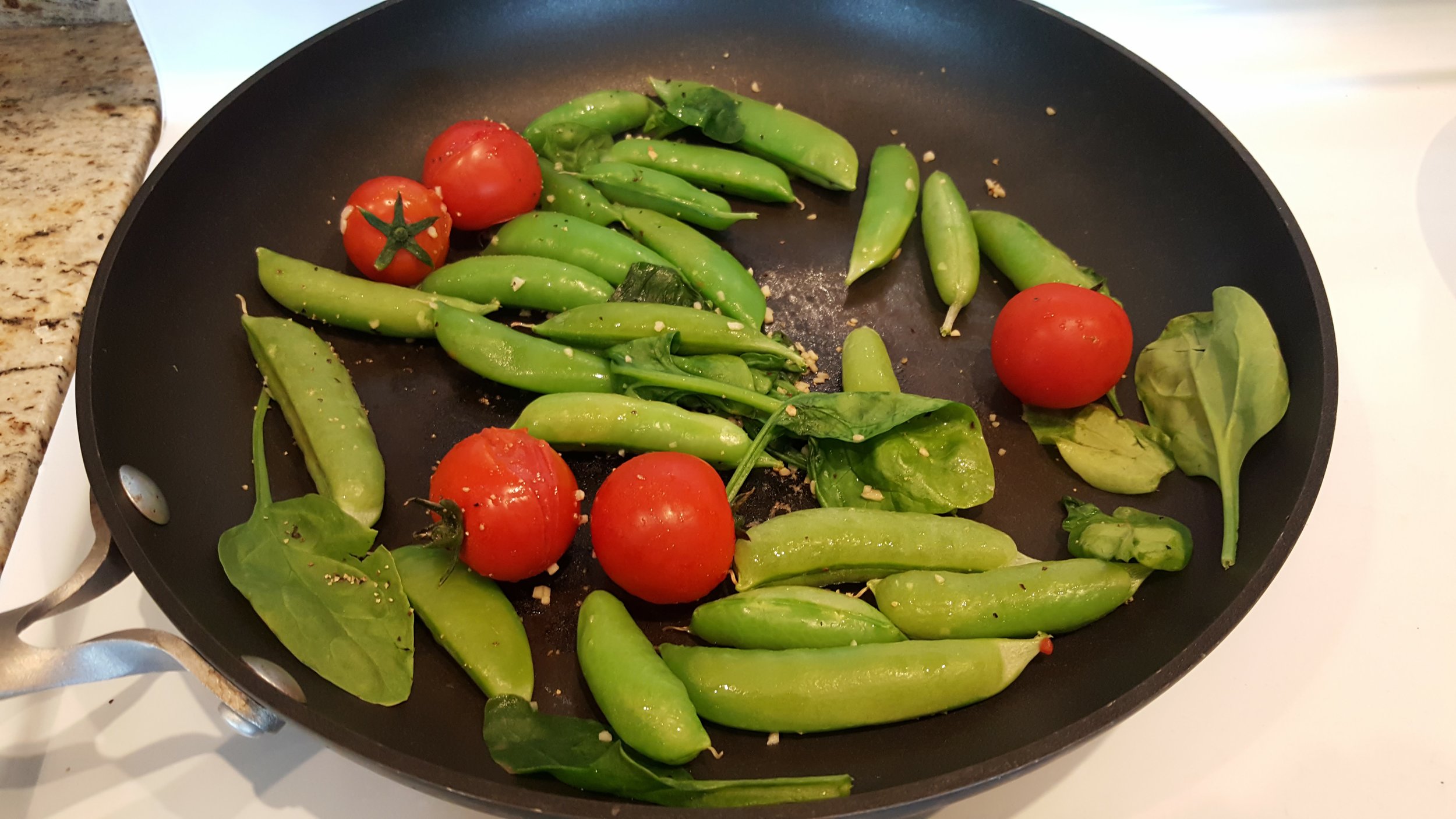 The freshest snap peas and tomatoes for breakfast