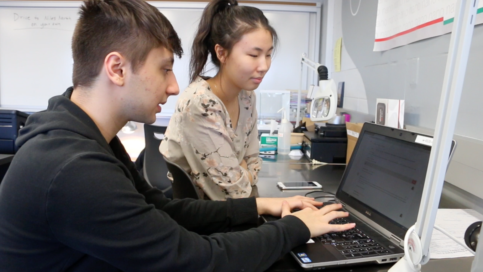 Jasmine Kee, right, works on a project in her College Introduction to Nanotechnology class. Kee signed up for District 214's Mentor Matching Engine and connected with an industry professional to get feedback on a class project. 