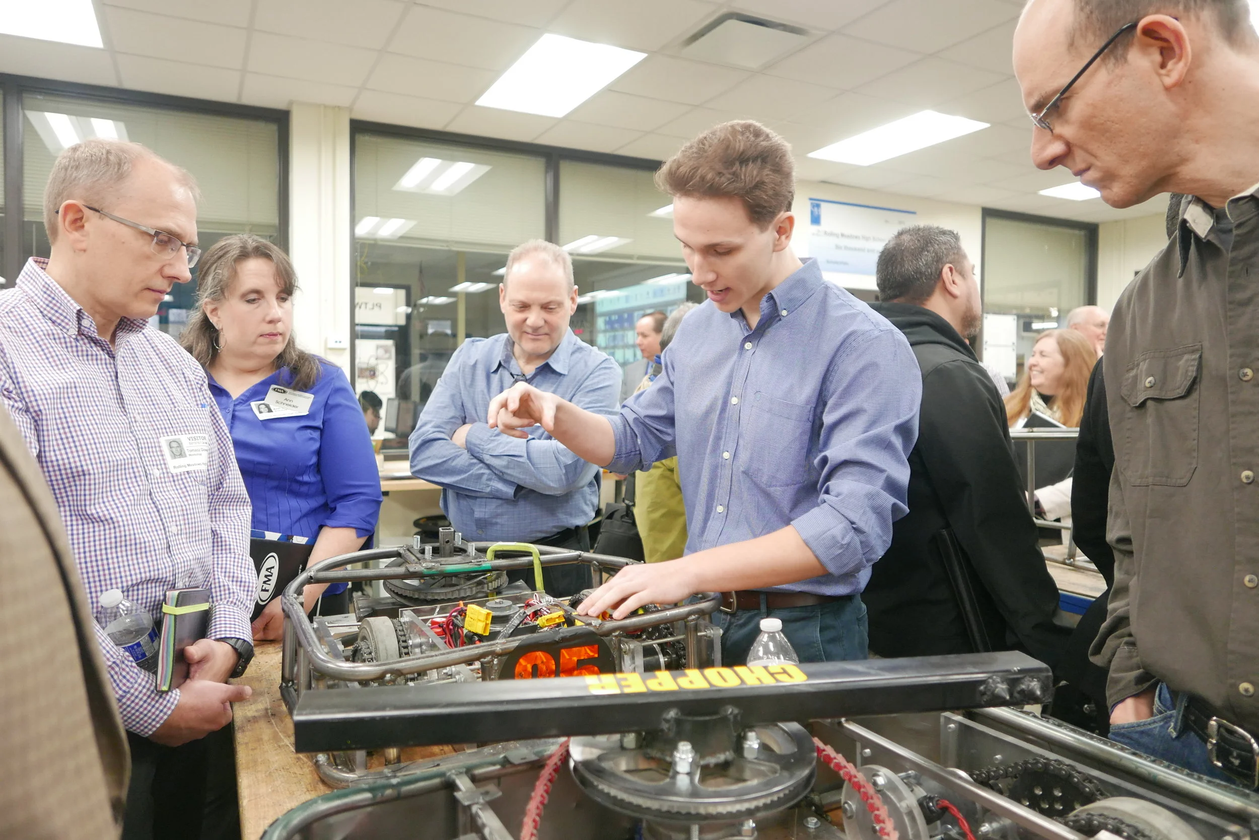 Area companies see District 214's manufacturing program in action