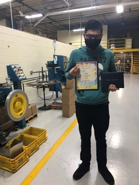 D214 life program graduate lands full-time manufacturing job