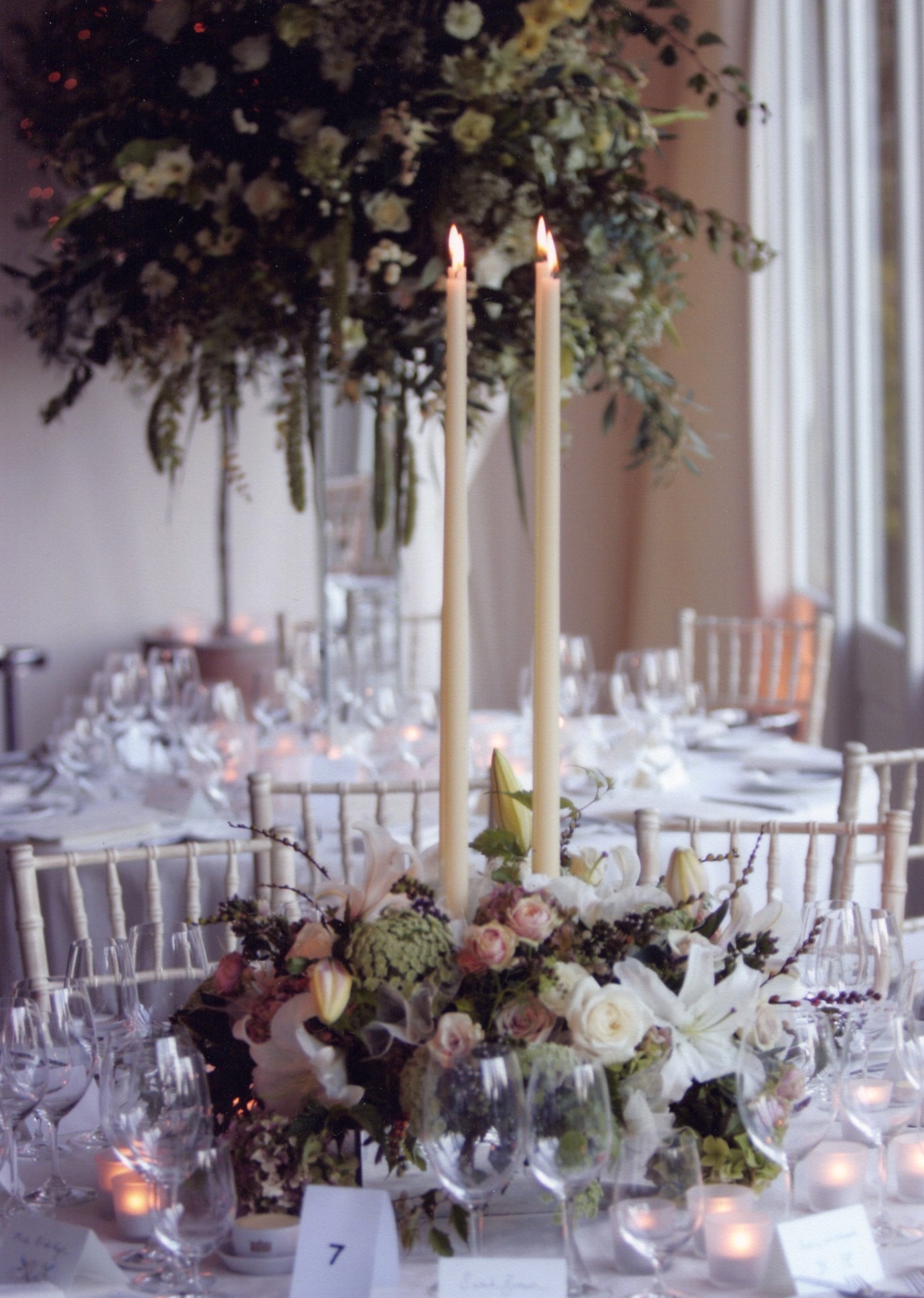 High and low mirror arrangements in soft colours with candles.jpg
