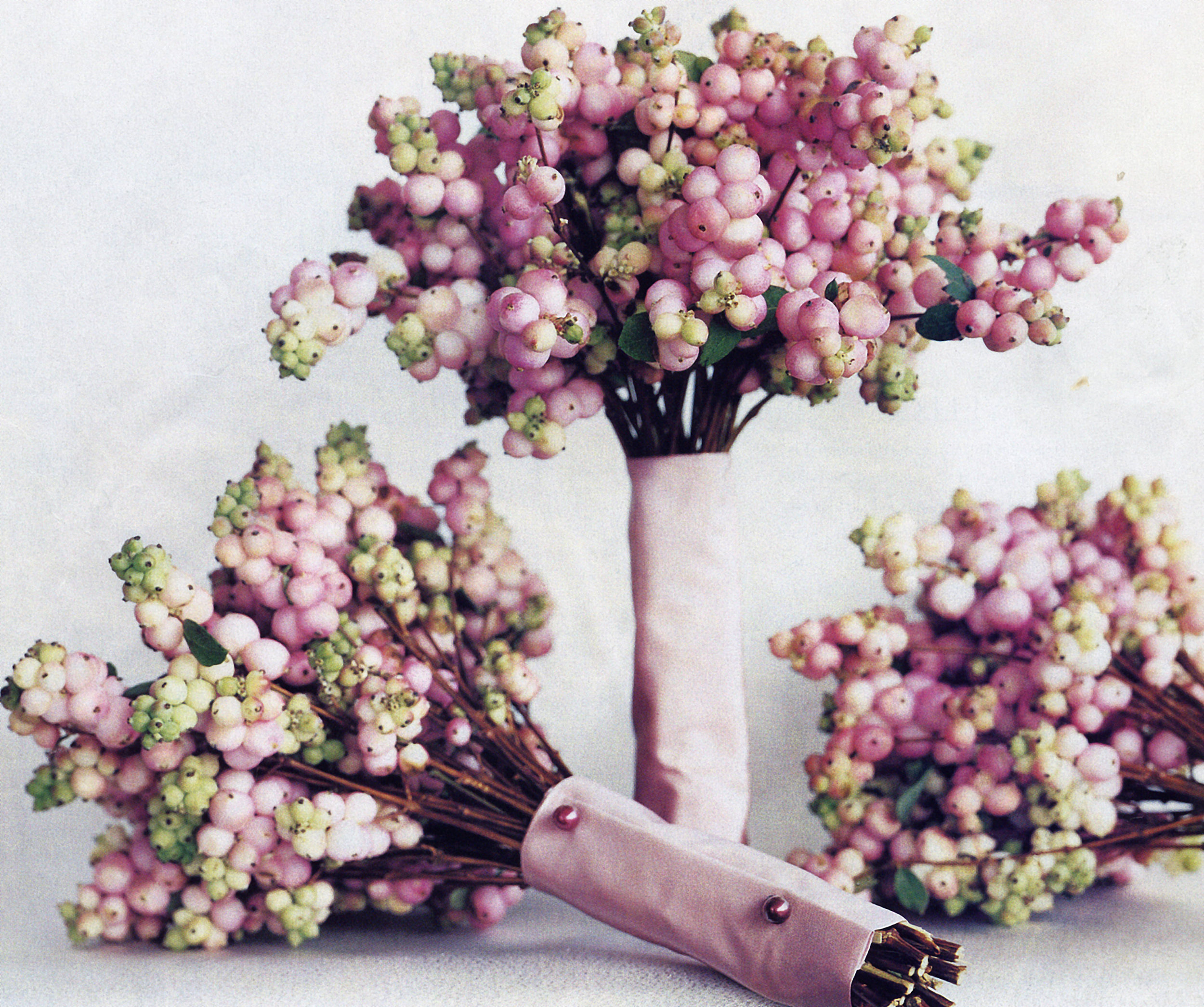 Pink snowberry bouquets.jpg