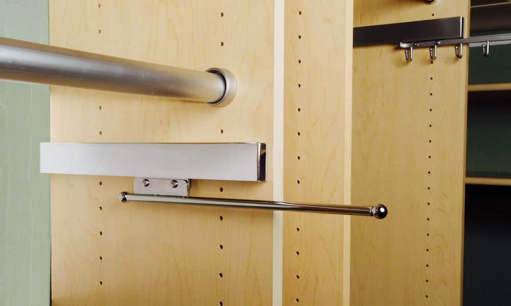 Details like the closet valet rod make the difference between a custom closet you love and one that simply holds your stuff. Call Closets of Tulsa today to see what’s possible: 918.609.0214