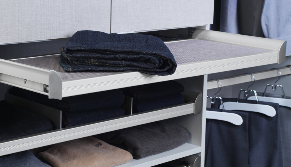 Pullout shelves make it easier to edit your wardrobe as you clean out your closet. Call Closets of Tulsa today for a  FREE virtual consultation and 3-D closet design :  918.609.0214