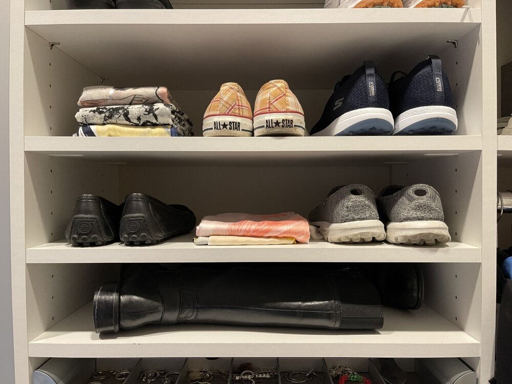 Store taller boots horizontally to eliminate having to constantly set them back upright. Have questions? Call Closets of Tulsa today for a FREE Consultation & 3-D Closet Design: 918.609.0214