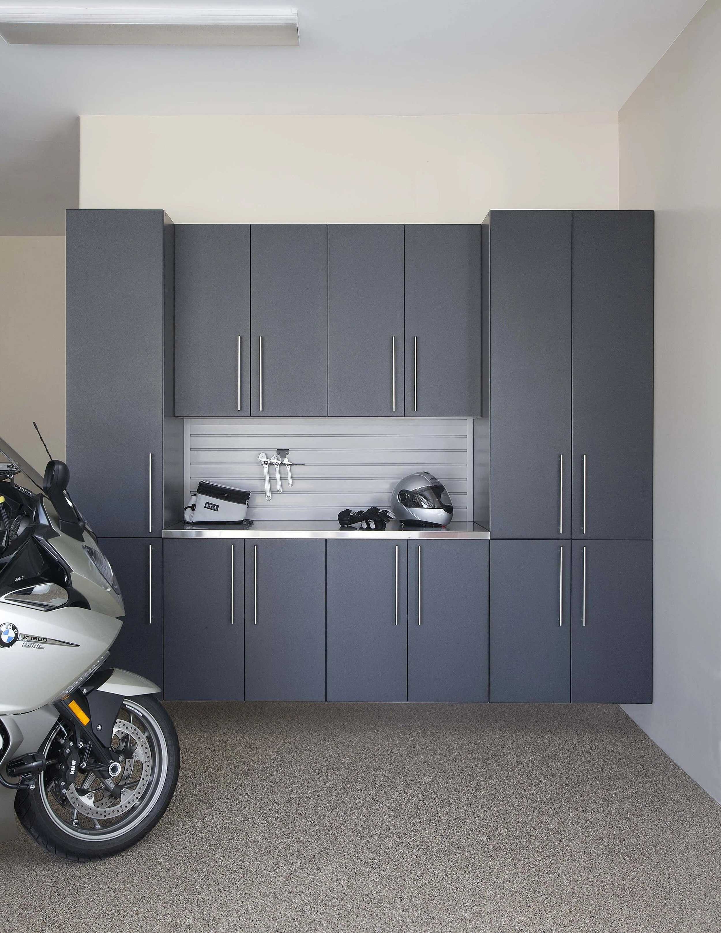 Granite Doors-Stainless with Gray Slatwall-Motorcycle-Straight-Sedona Floor-Feb 2013.jpg