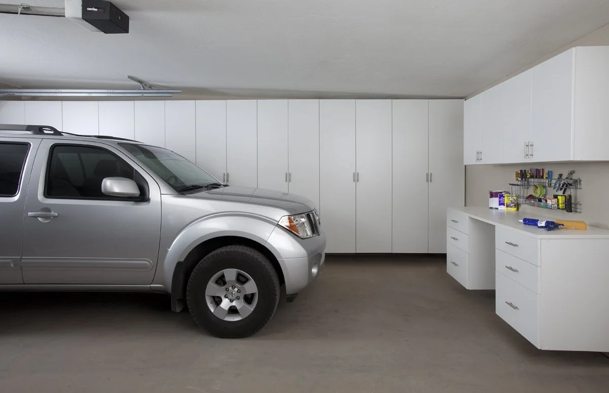 White Garage Cabinets with Workbench-SUV.jpg