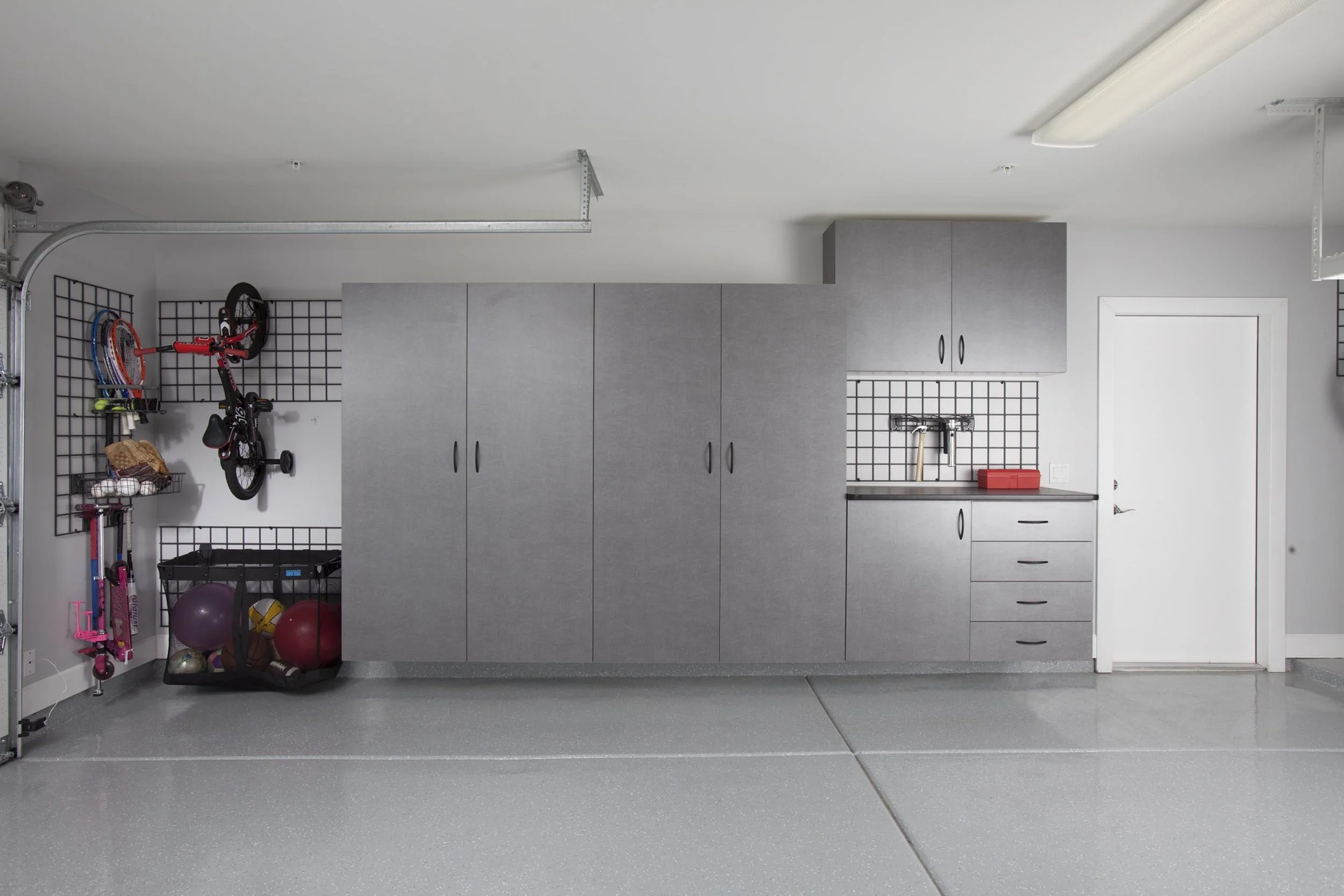 Pewter Garage with Workbench-Gridwall-Kid Bikes-Large Ball Net 2012.jpg