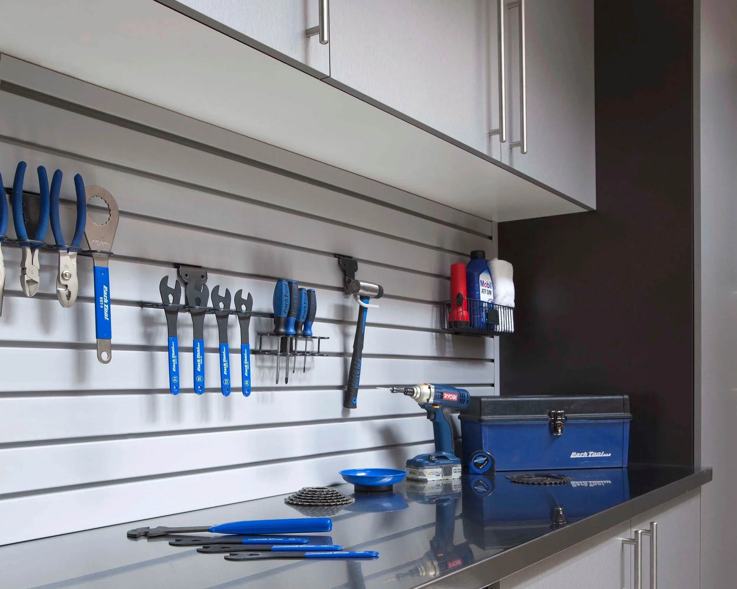 Silver-Cabinets-Stainless-Workbench-Drawer-Open-Gray-Slatwall-Feb-2013.jpg