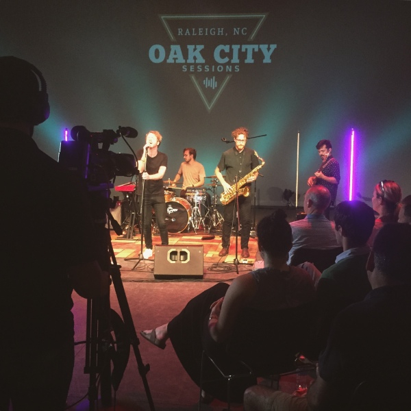 Hotline recording their episode of Oak City Sessions in front of a live studio audience. 