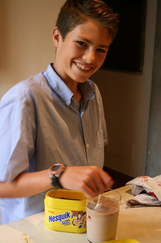 Caleb making chocolate milk