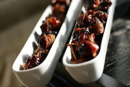 almond stuffed, bacon wrapped dates.