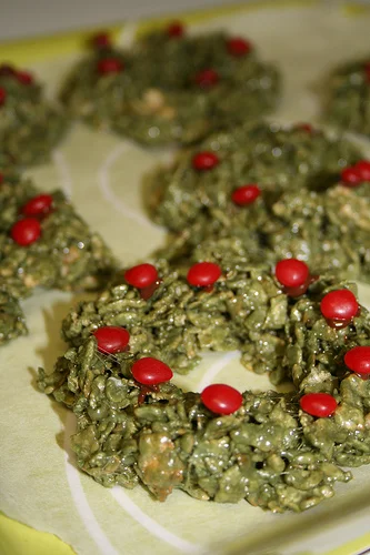 What's circular, dotted with holly, and green all over?