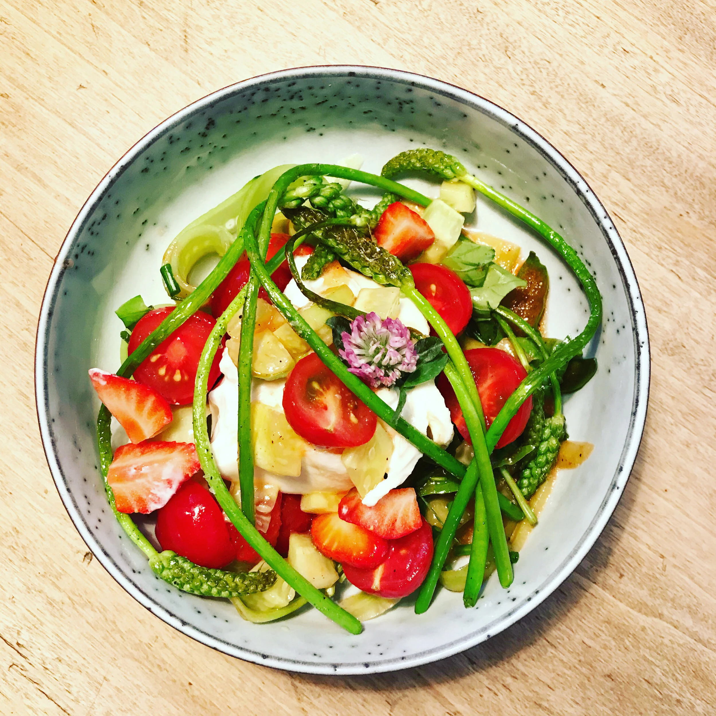 Wild asparagus with burrata, cucumber and strawberry salad