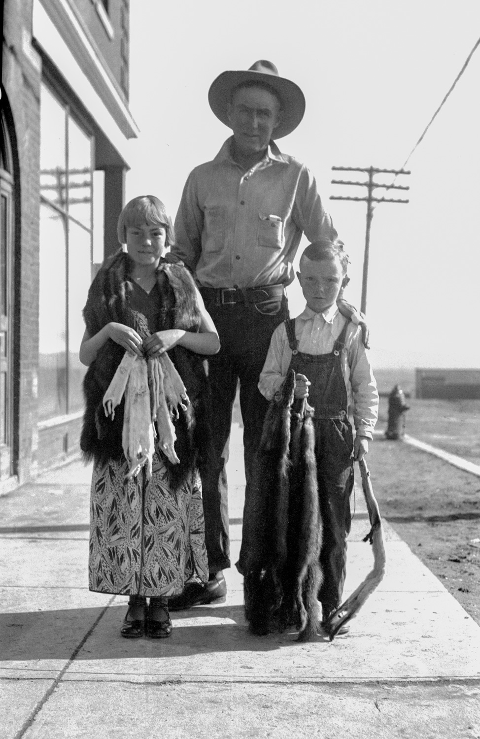 Cowboy with children, 1935