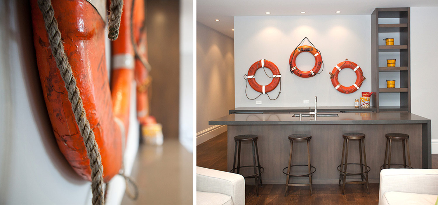 Bar with bar stools, sink and life preservers hung on the wall, barstools, marine art