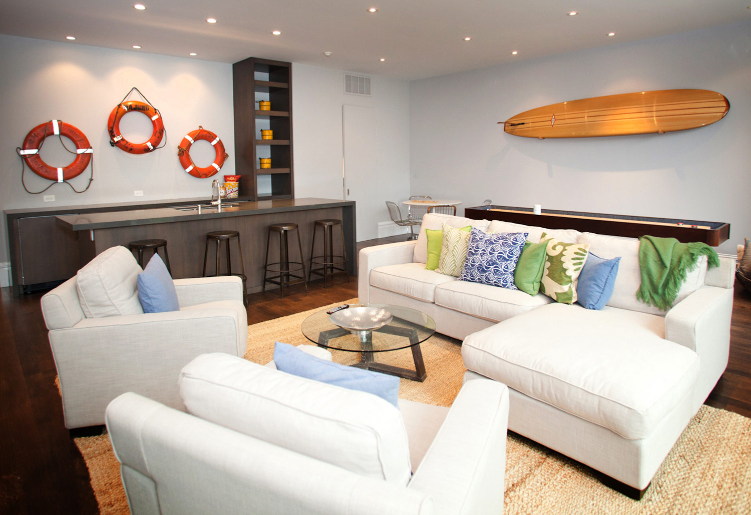 living room, pool house, pool bar, barstools, pool couch, coffee table, grass rug