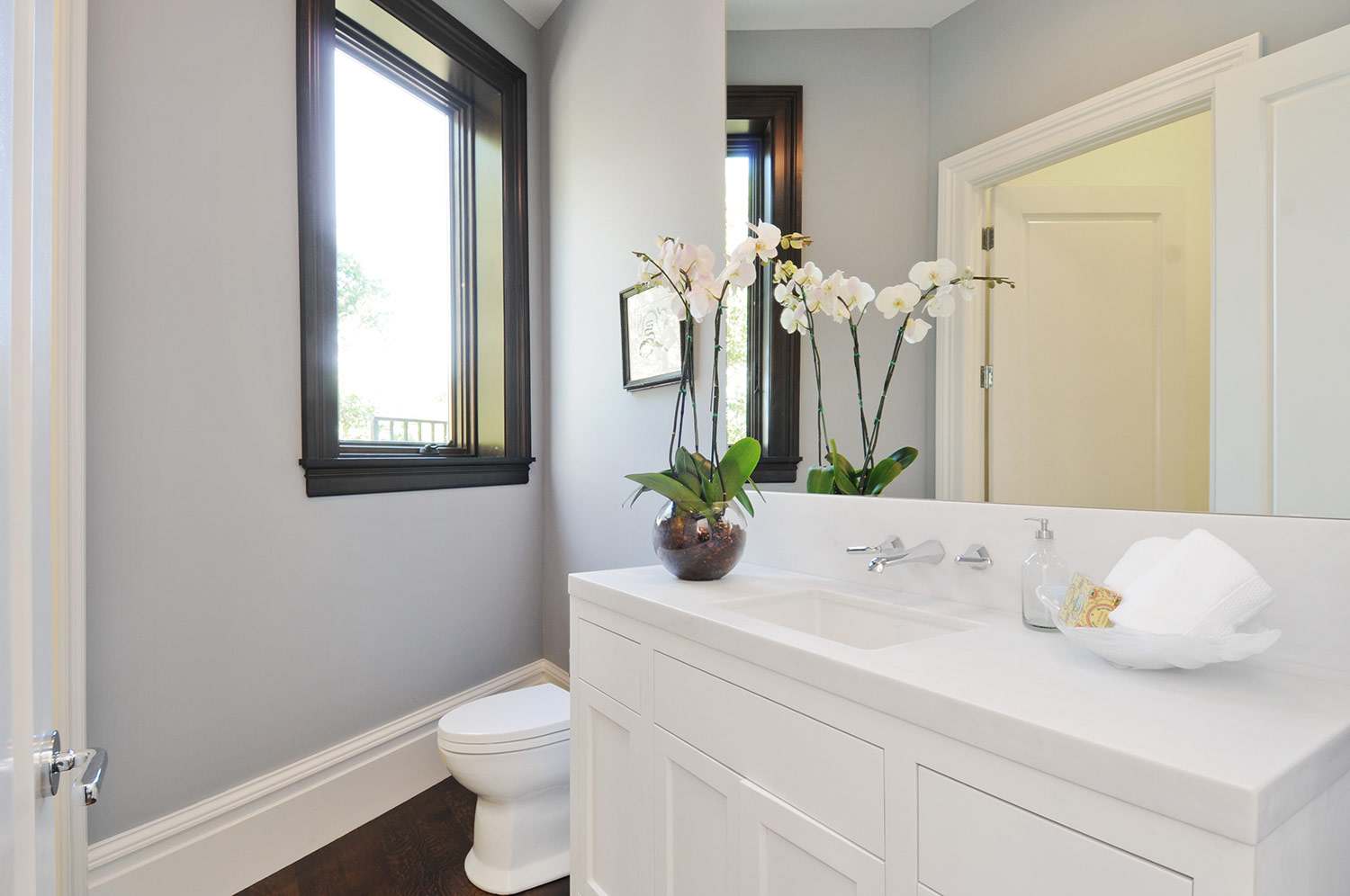 window trim, modern bath, small bathroom design, angled bathroom design, bathroom vanity, bathroom sink, polished chrome faucet