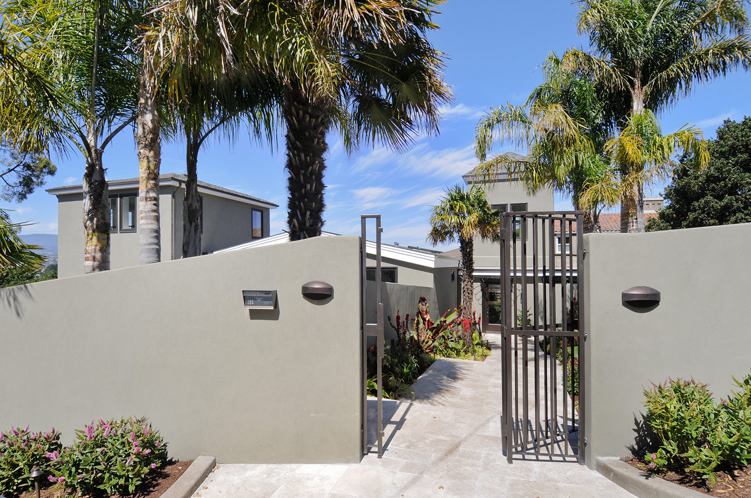 entry, home design, walkway, stone path, stucco, iron gate