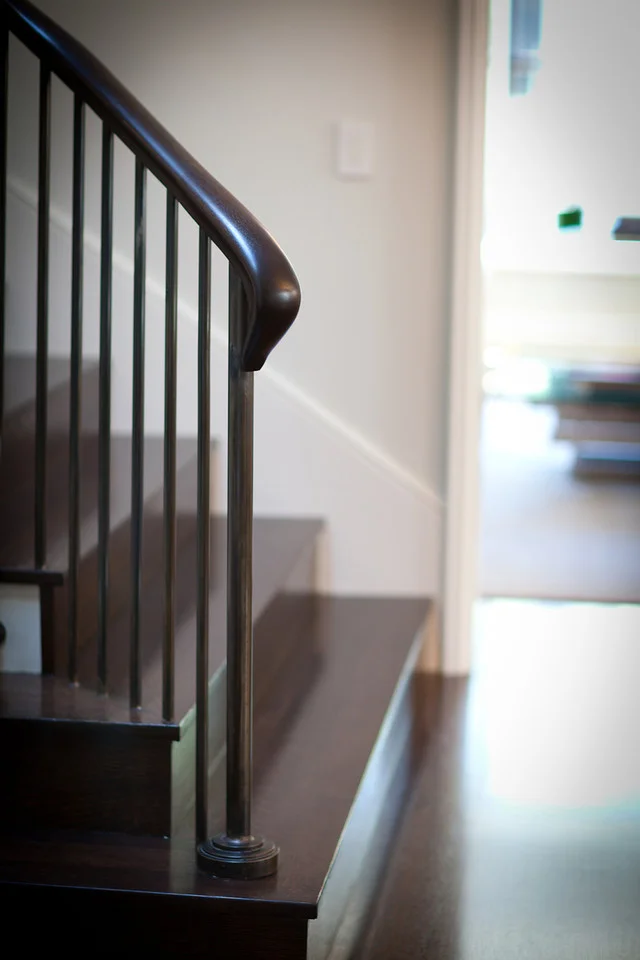hardwood floor, staircase, stair railing, traditional staircase