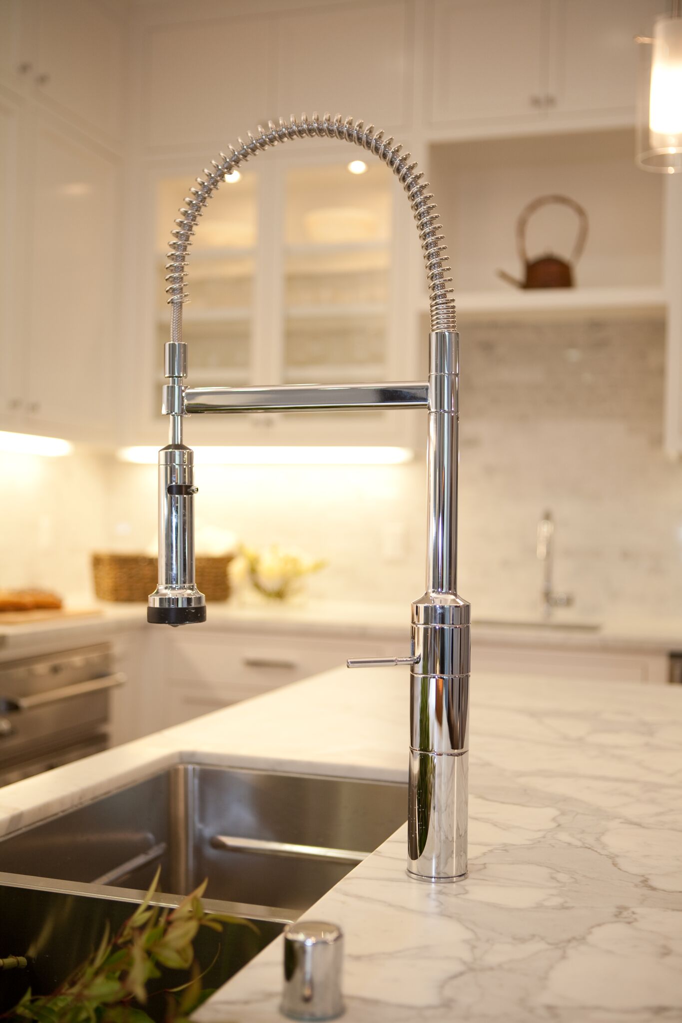 kitchen, bar stools, breakfast nook, stainless steel appliances, carerra marble counters, subway tile backsplash, polished nickel faucet