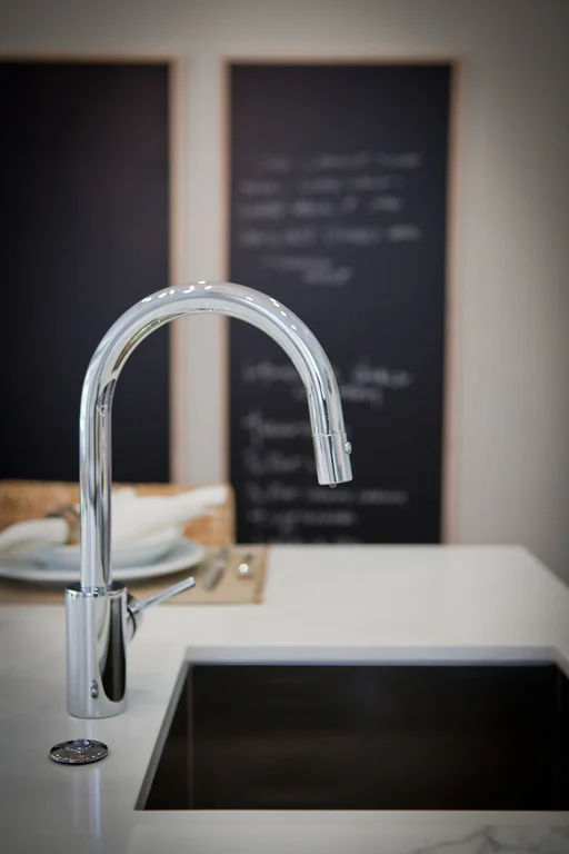 polished chrome, sink, kitchen, kitchen island, marble counters