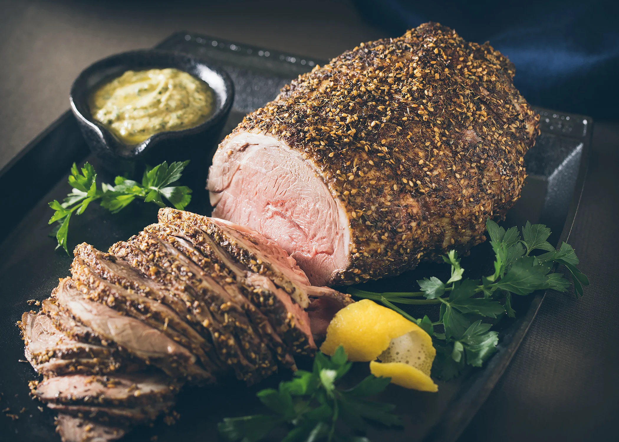 Mediterranean_Leg_of_Lamb_with_Tahini_Sauce_HERO_V2.jpg