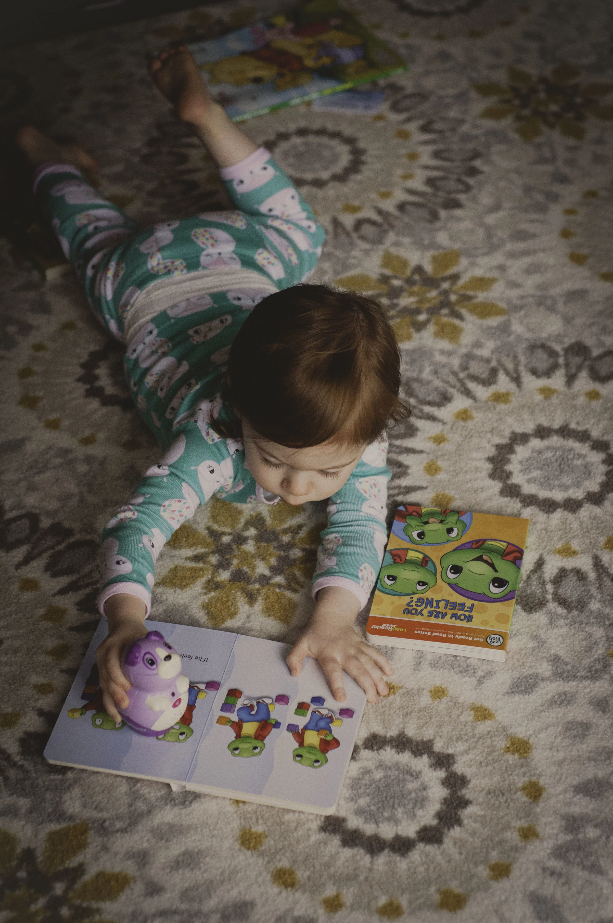 Ellie reading on floor edit.jpg