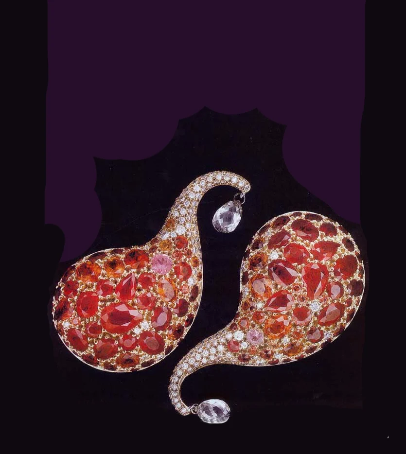 "1001 Nights" Oversized Clip Earrings: 18K Yellow gold and platinum, 25.66ct. rubbies, and various shades of pink sapphires, 1.68ct. white diamonds pav´, 2 diamond briolettes 1.86ctTW.