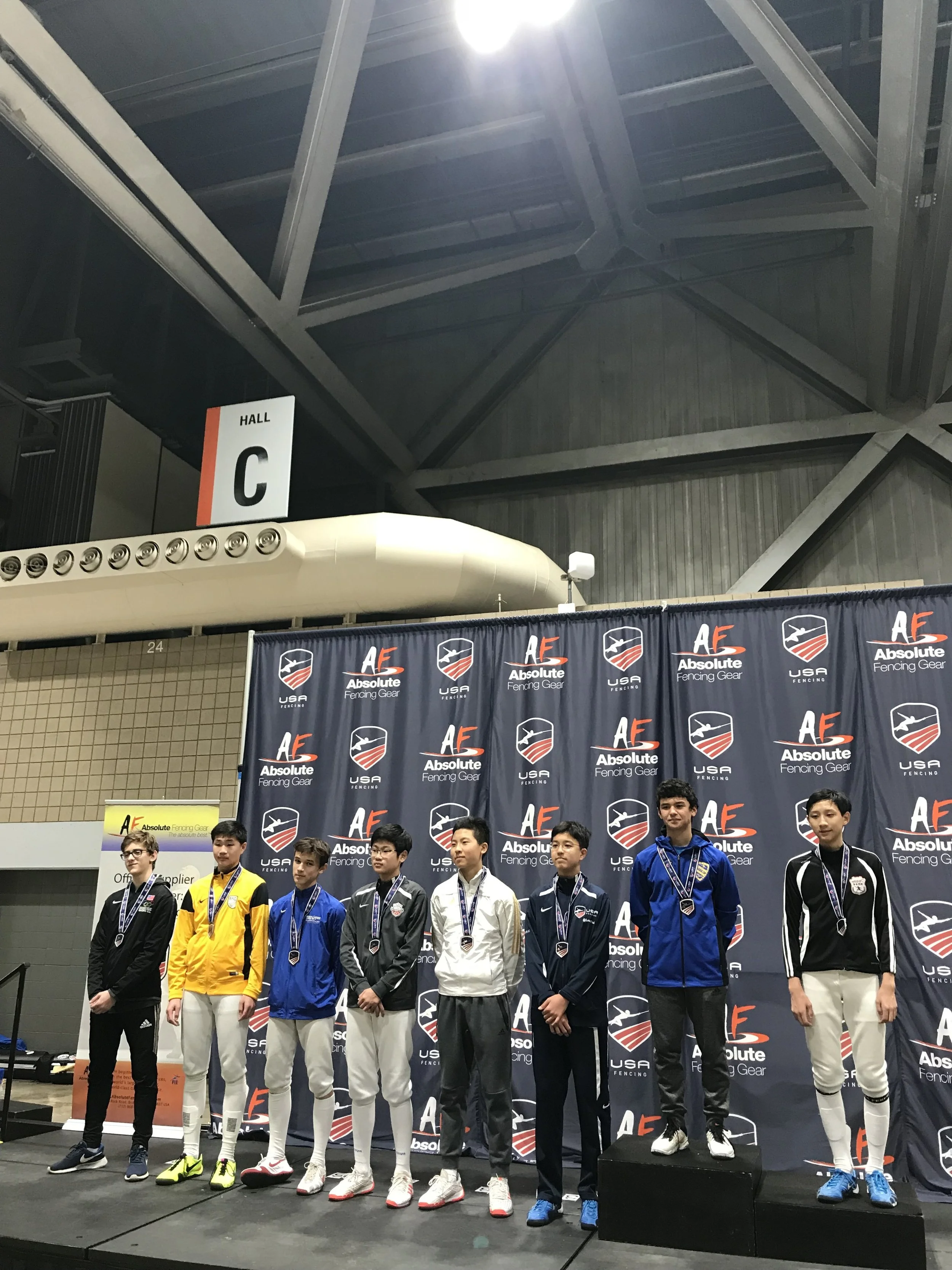 Third from right: Ethan Um, 3rd in Y14 Men’s Foil. Ethan also received his A18 rating.