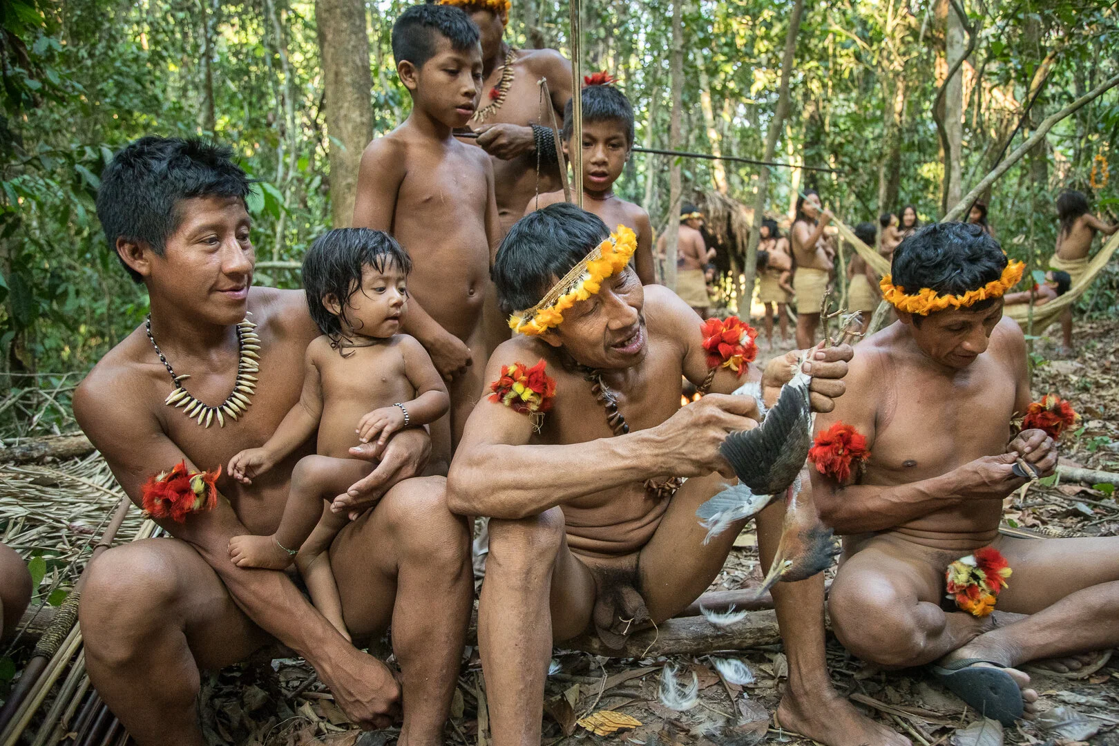 Awã men after hunting