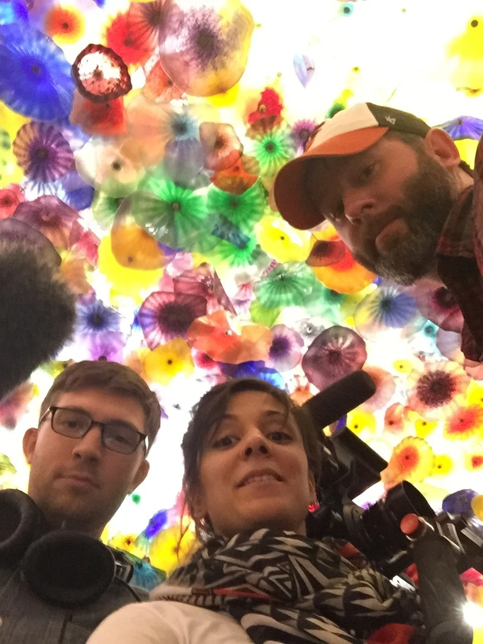 Zachary Kulzer, Sareen Hairabedian, and George Burroughs capturing B-Roll in the lobby of the Bellagio Hotel in Las Vegas