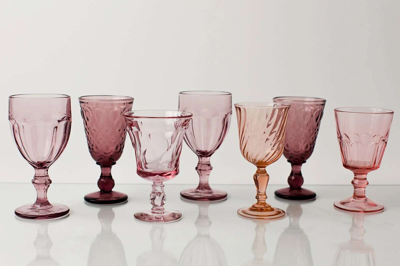 stemmed goblets in purples and pinks .jpeg