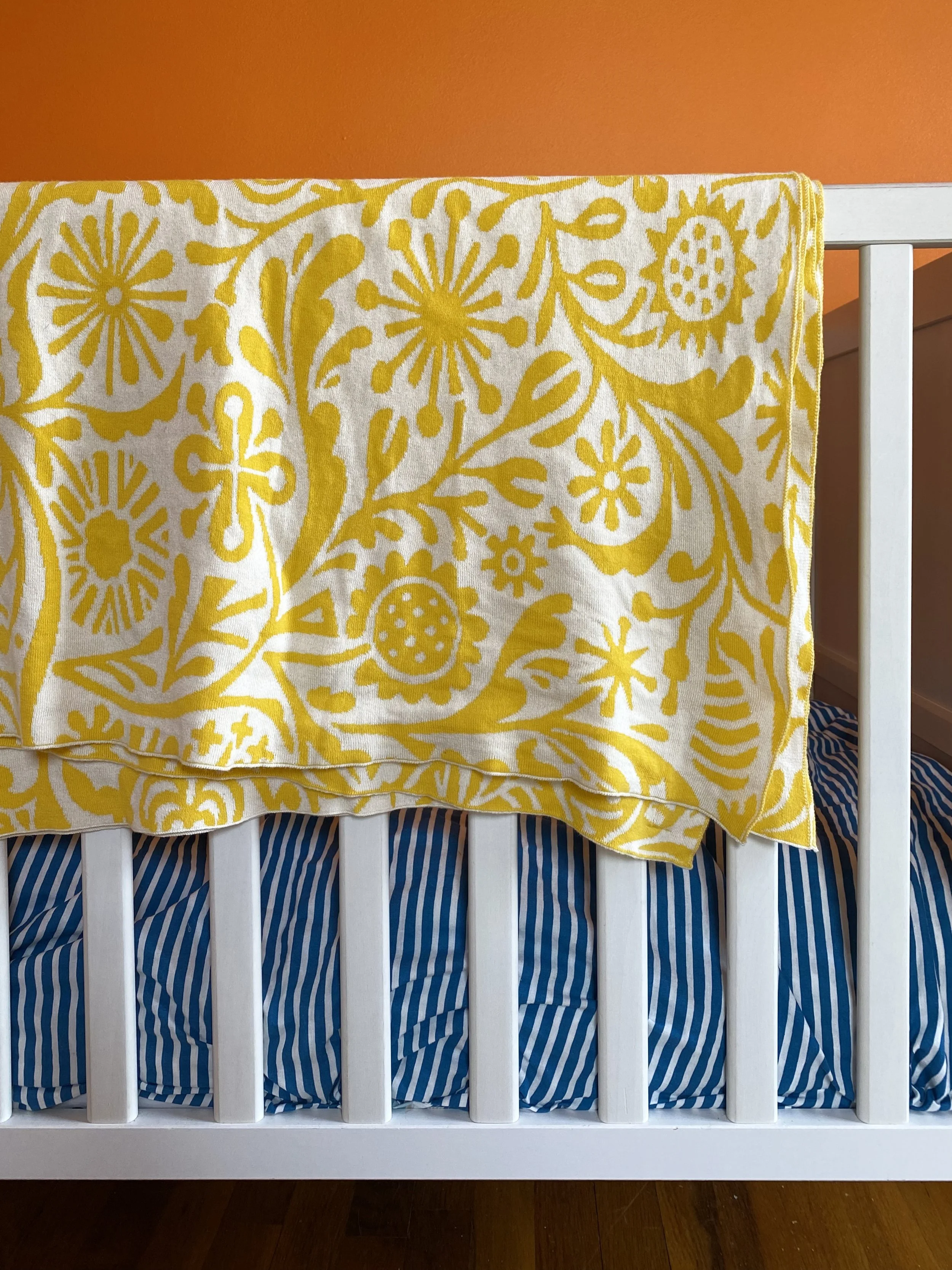 Sunshine_Blanket_on_crib.jpg