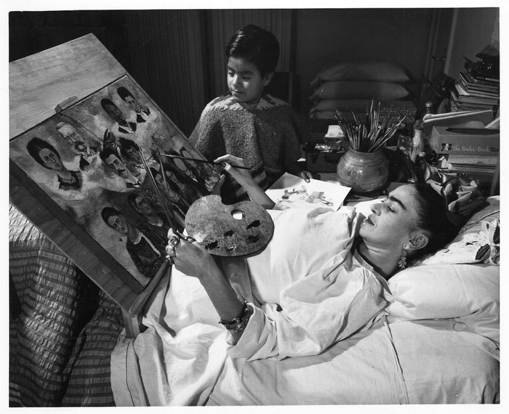 Frida Kahlo, painting in bed