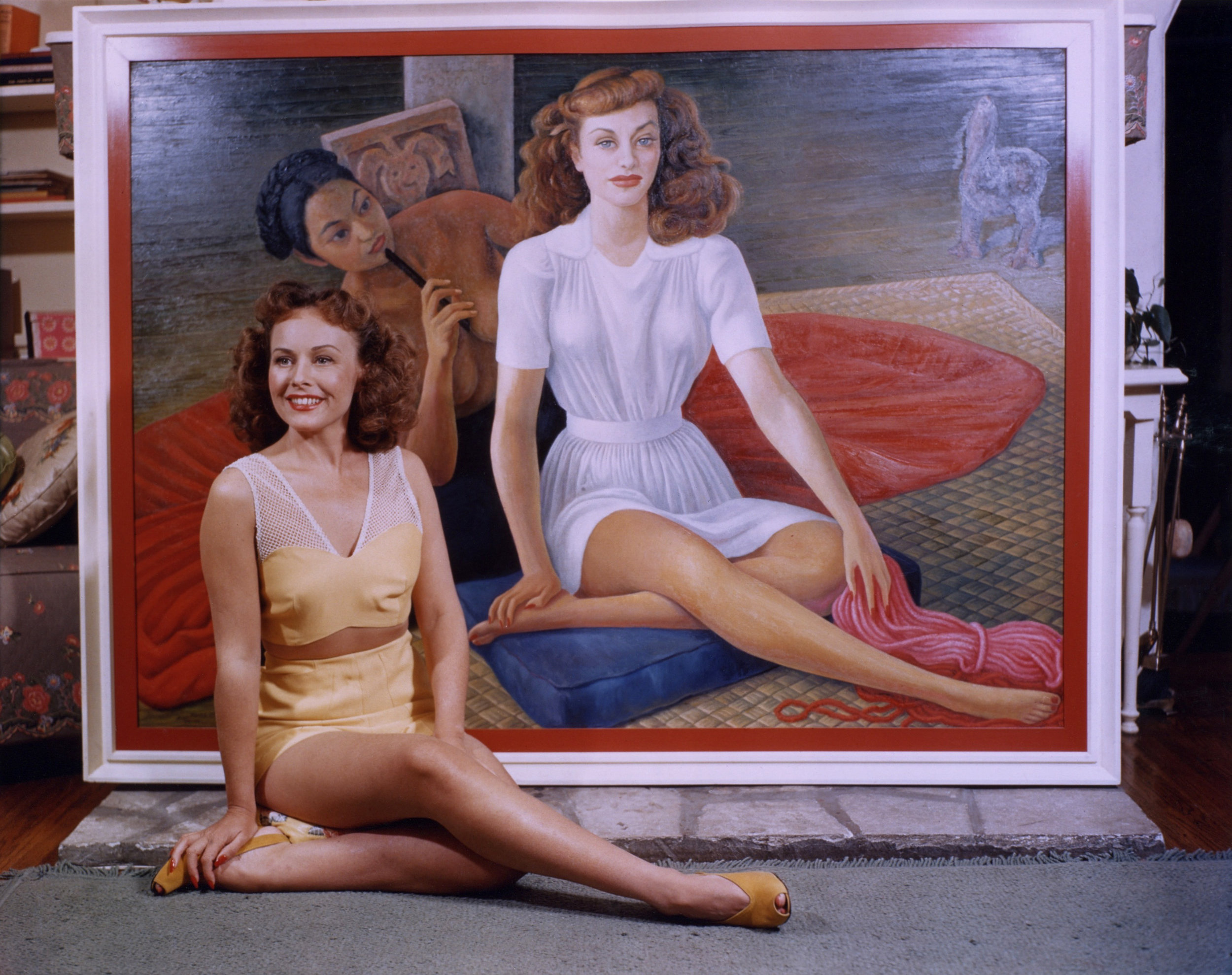 Paulette Goddard with Diego Rivera's portrait of her, executed 1940-41