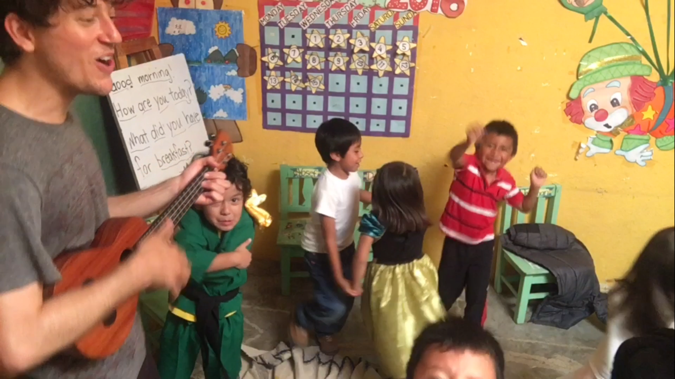 Playing fun and educational musical games with the enthusiastic Pre-Schoolers at Robert Muller Life School, Guatemala