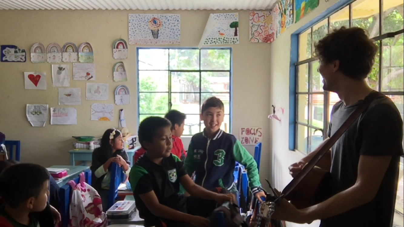 Preparing these 4th graders for their sining performance at Robert Muller Life School, Guatemala