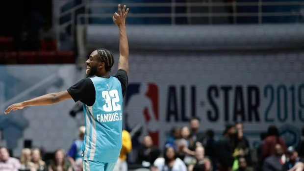 Famous Los celebrates after hitting a 3-point shot during the second half. (AP Photo/CP24)