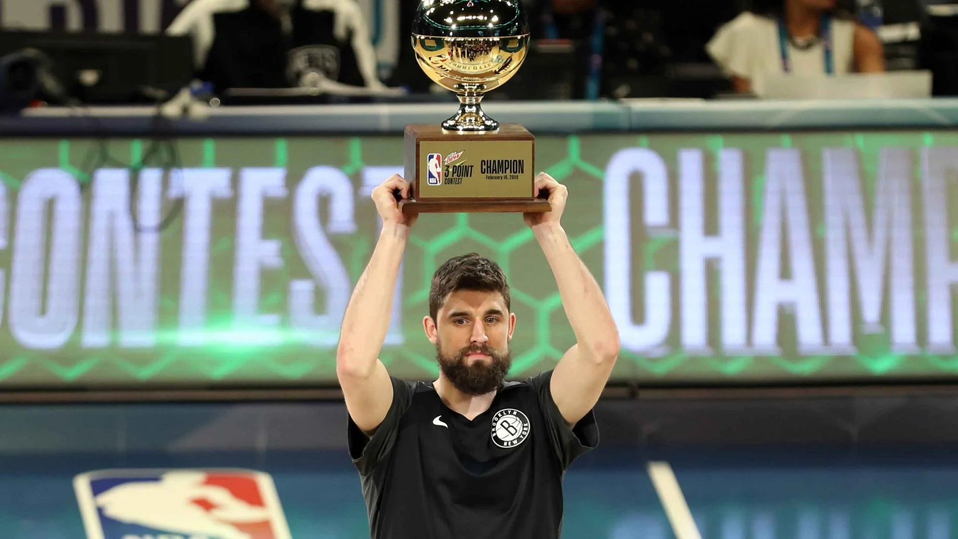 Brooklyn Nets Joe Harris received the 3-point championship trophy after defeated Stephen Curry in the finals. (AP Photo/ NBA.com)