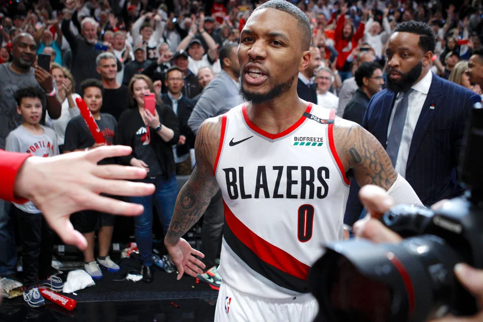 Trailblazer Guard Damian Lillard celebrates on game-winning shot. (Photo by: Oregon Live)
