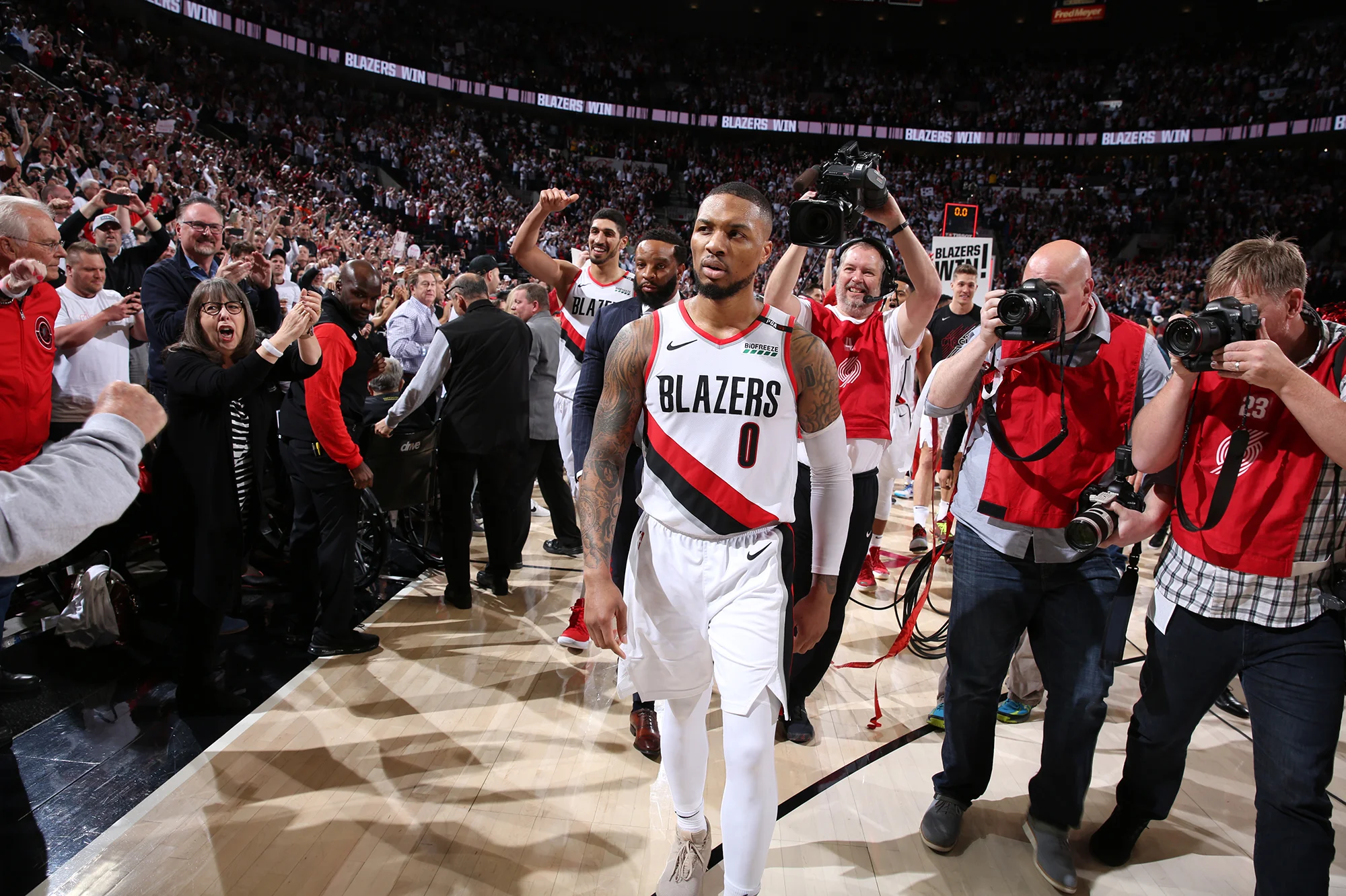 Damian Lillard walks off after post-game celebration in the first round of the NBA Playoffs (Photo by: Washington Post).