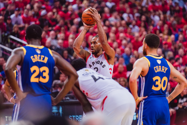 Kahwi Leonard led the way for the Raptors in their game 1 victory. (Photo by: NBA)