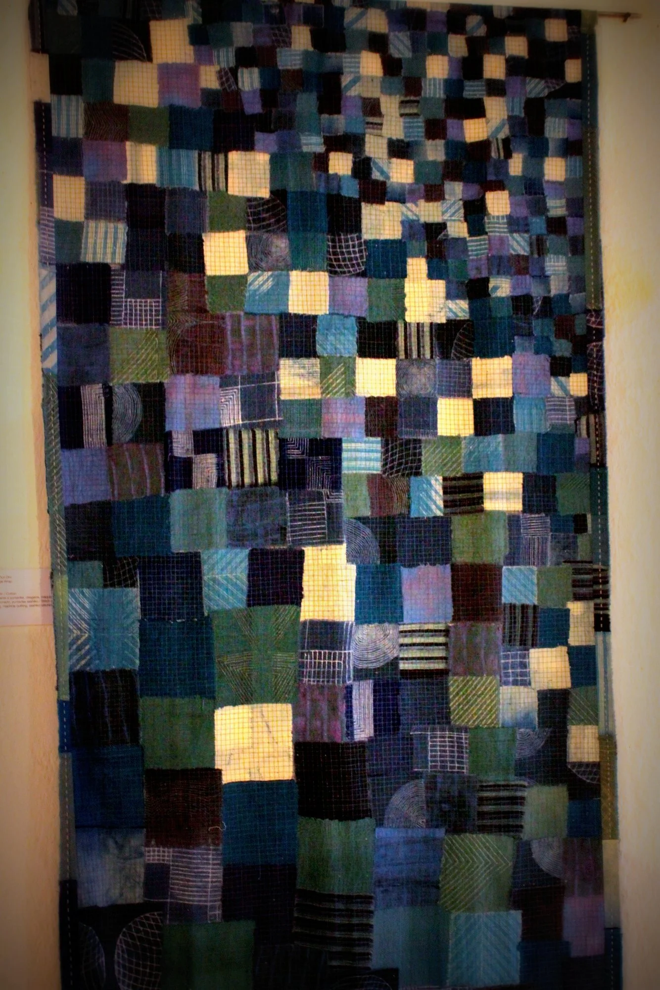 Neha Puri Dhir of India created this piece, Melange Wrap. It's also reminiscent of boro cloth, with machine quilting and sashiko stitching.