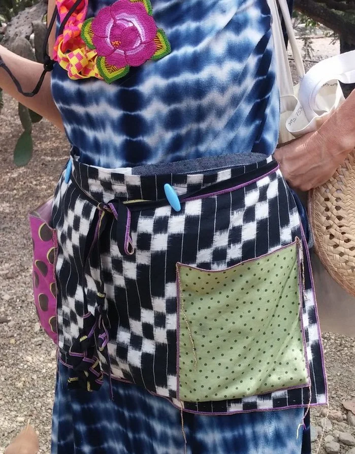 A conference attendee modeling her shibori and ikat garments
