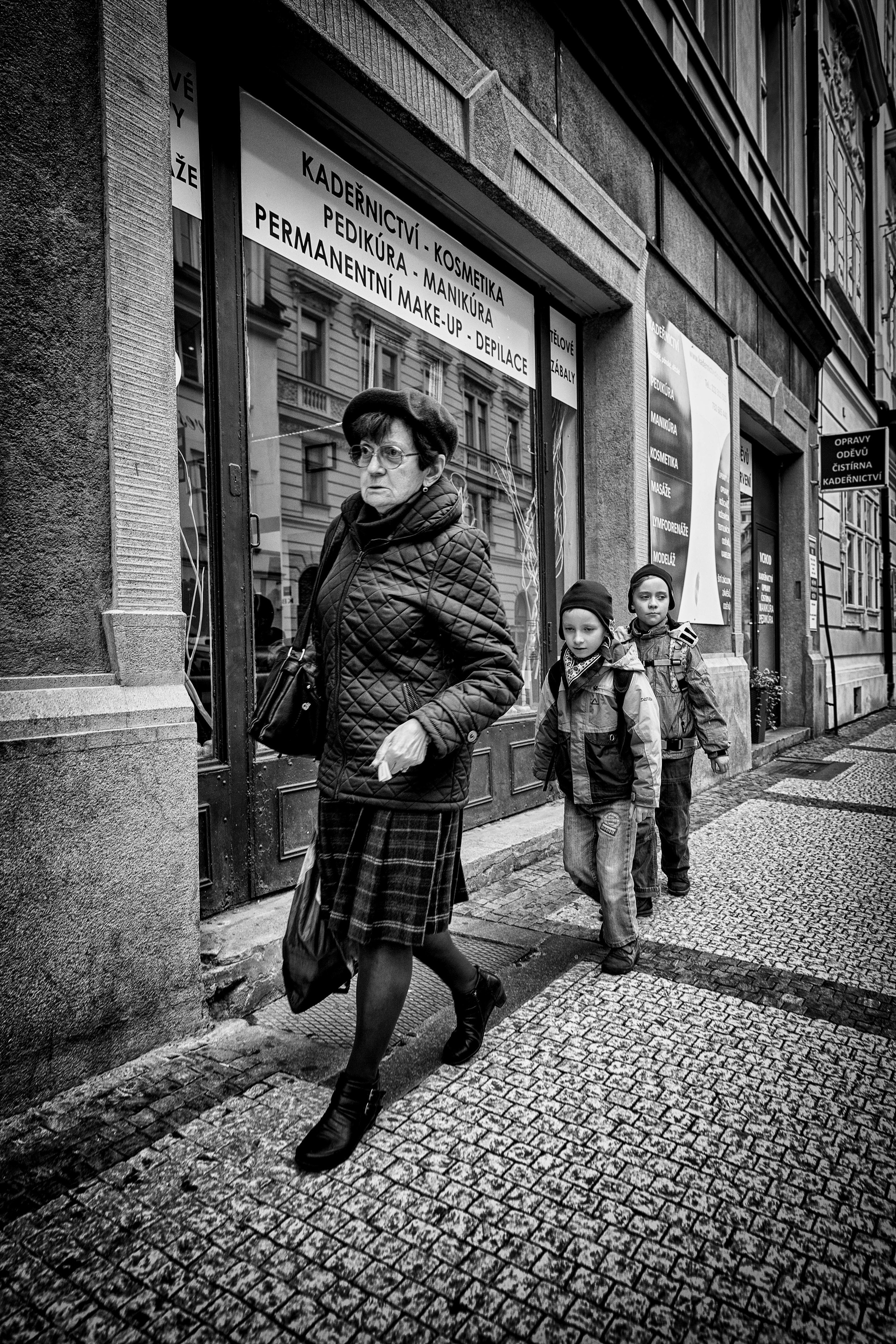 Grandmother's Footsteps. Prague, October 2016. These two seemed to be following their grandmother very carefully and almost discretely - just like the children's playground game.