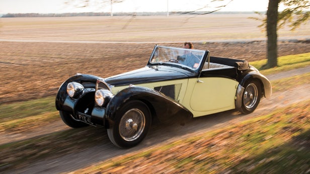 This 1937 Bugatti Type 57S Cabriolet by Vanvooren was the surprise top seller of the auctions, fetching $7.7 million. A highly original, unrestored example of the 42 Type 57S chassis produced, and one of just three extant by Vanvooren. | Official Auction Page(Credit: Darin Schnabel | RM-Sothebys)