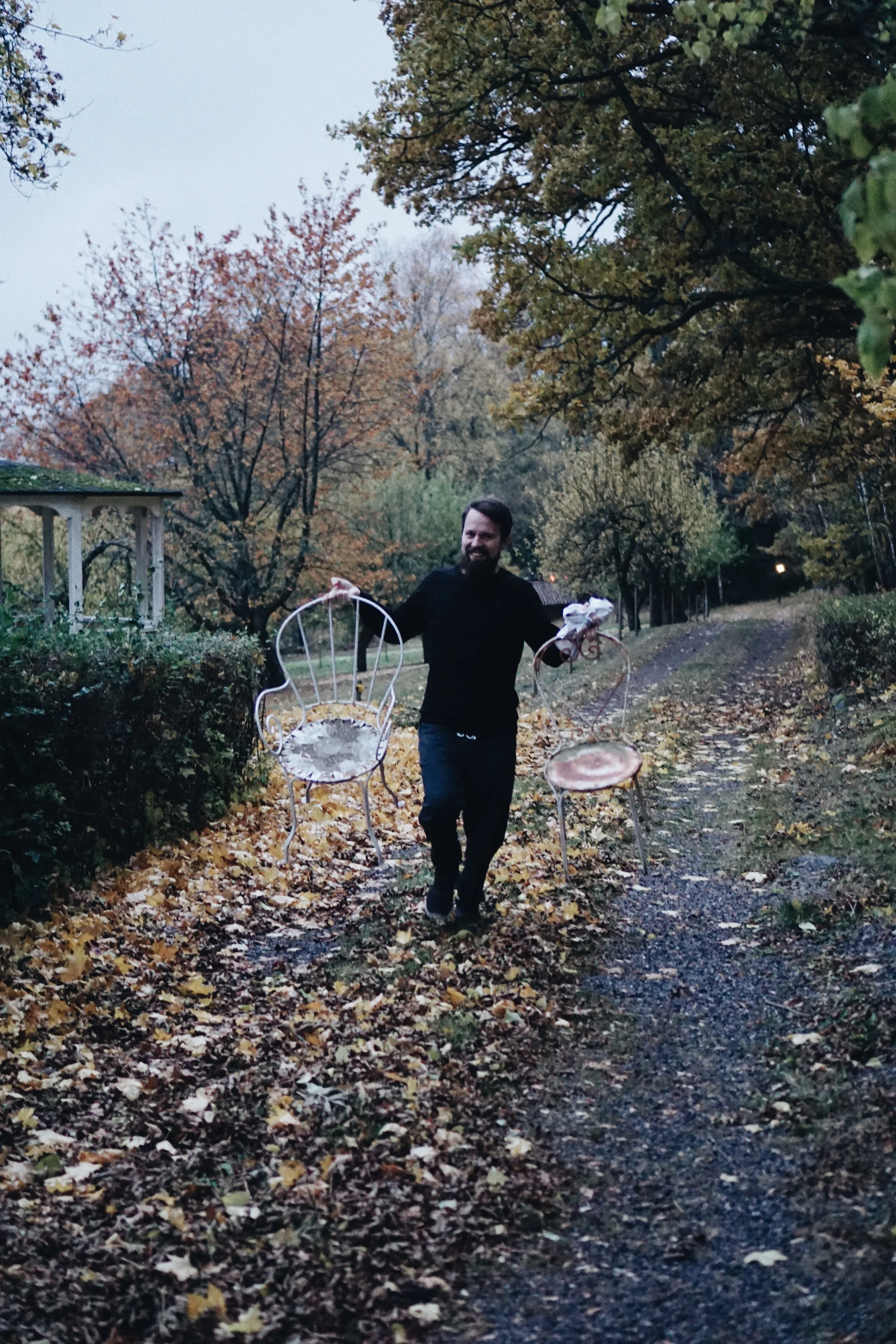 Anton running in the rain trying to take the shot before the sun sets