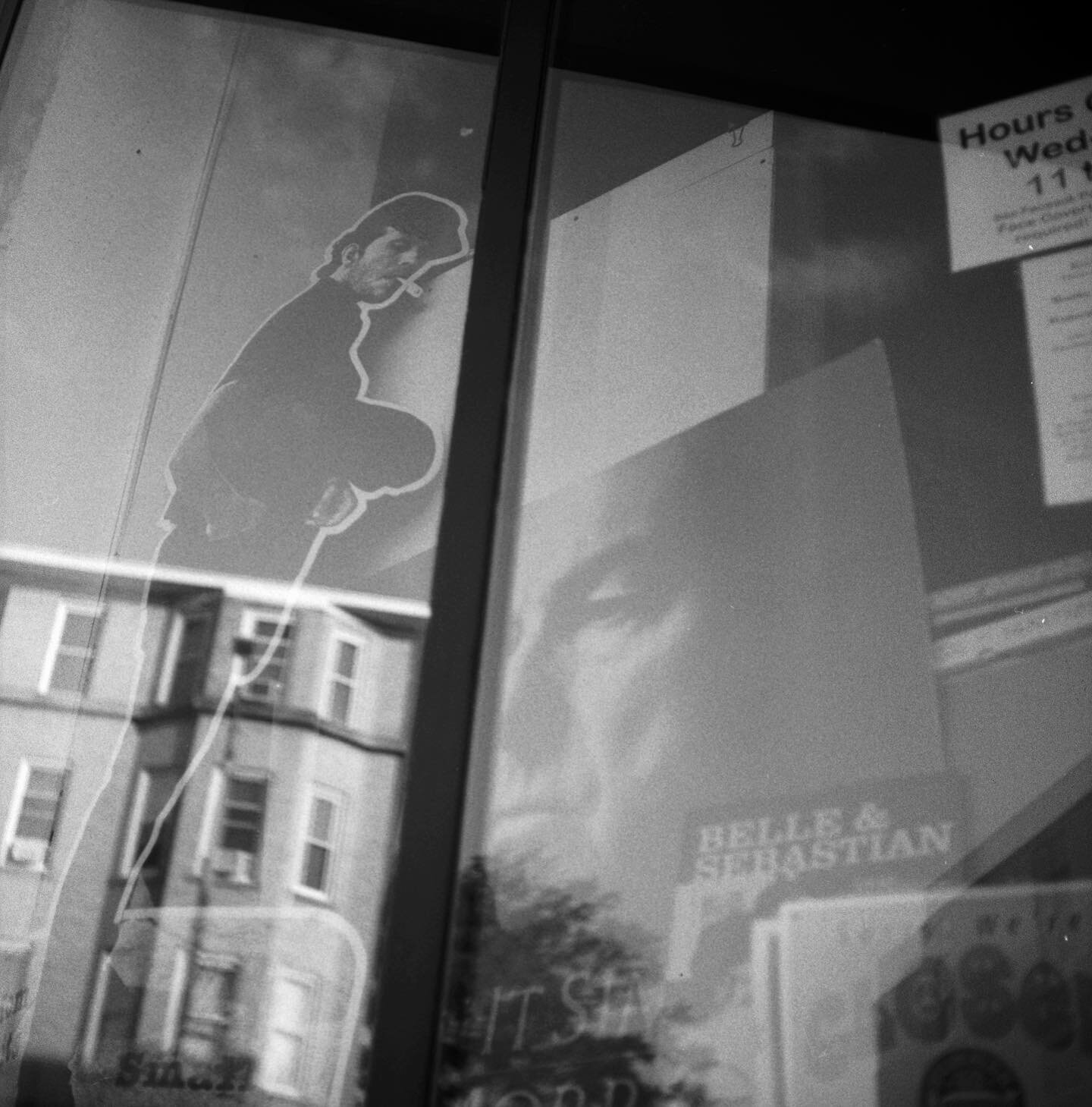 Oh hi, Tom. The Record Exchange. Salem, MA. Shot on Ilford HP5+ 400 ISO film. Rolleiflex 120mm.